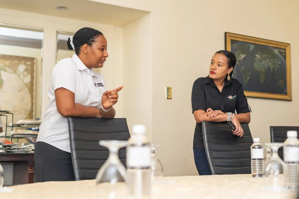 General manager of the Honey Bun Foundation Nashauna Lalah (right) listens attentively to a point being made by Shenice Taylor during the foundation’s CEO Luncheon Series. General manager of the Honey Bun Foundation Nashauna Lalah (right) listens attentively to a point being made by Shenice Taylor during the foundation’s CEO Luncheon Series.